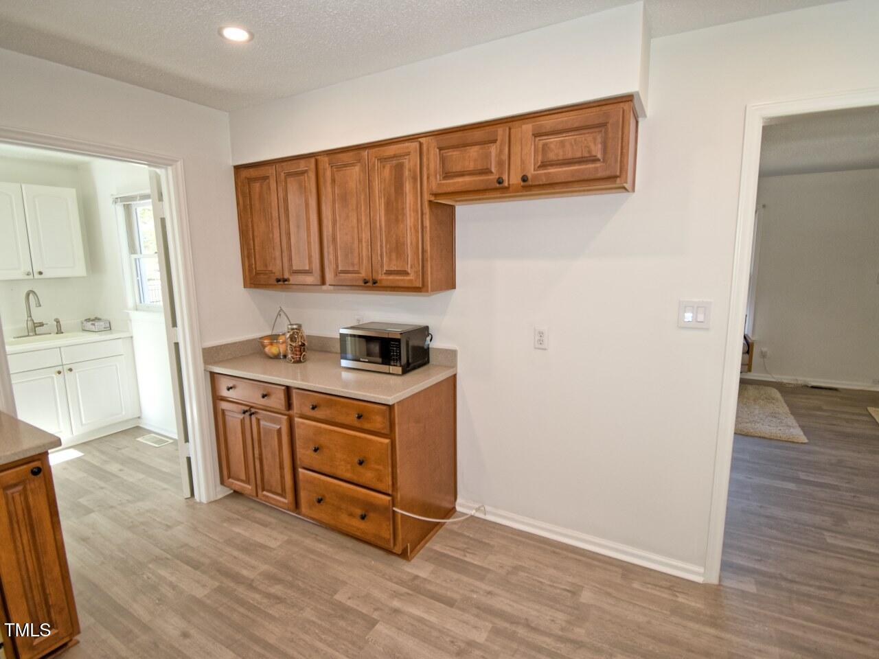 3217 Banks Road Raleigh, NC 27603 - Photo 9 of 29 a room with storage and utility