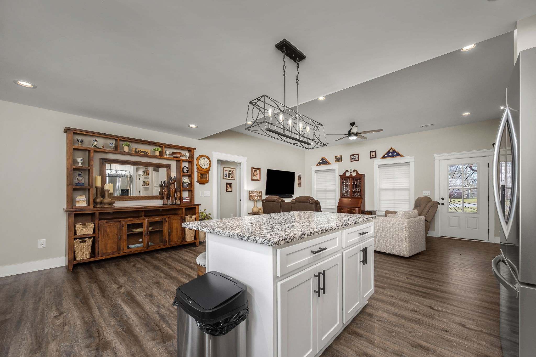104 Rolling Road Shelbyville, TN 37160 - Photo 13 of 44 a open kitchen with stainless steel appliances granite countertop a stove and refrigerator