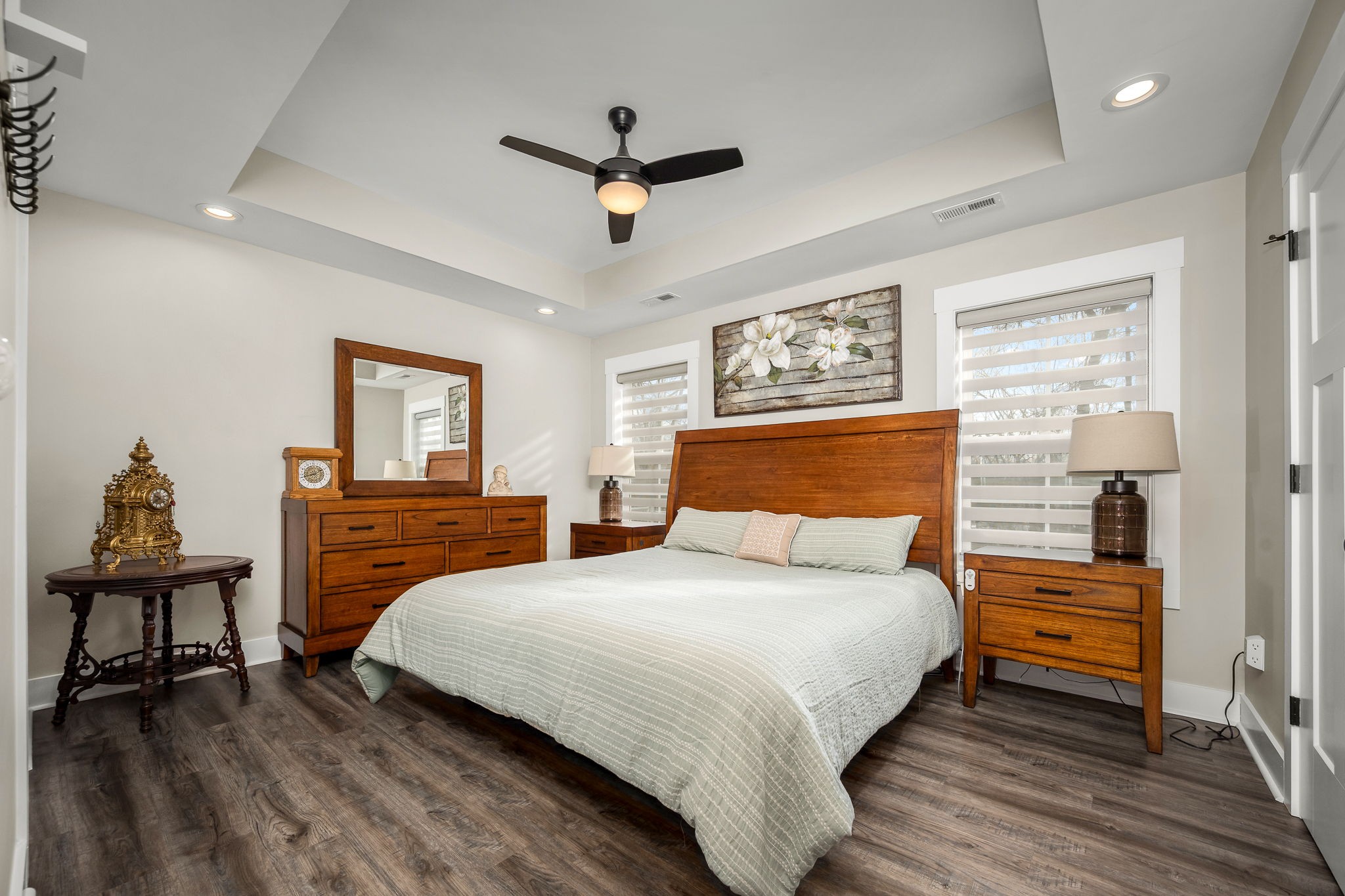 104 Rolling Road Shelbyville, TN 37160 - Photo 18 of 44 a bedroom with a bed and a chandelier