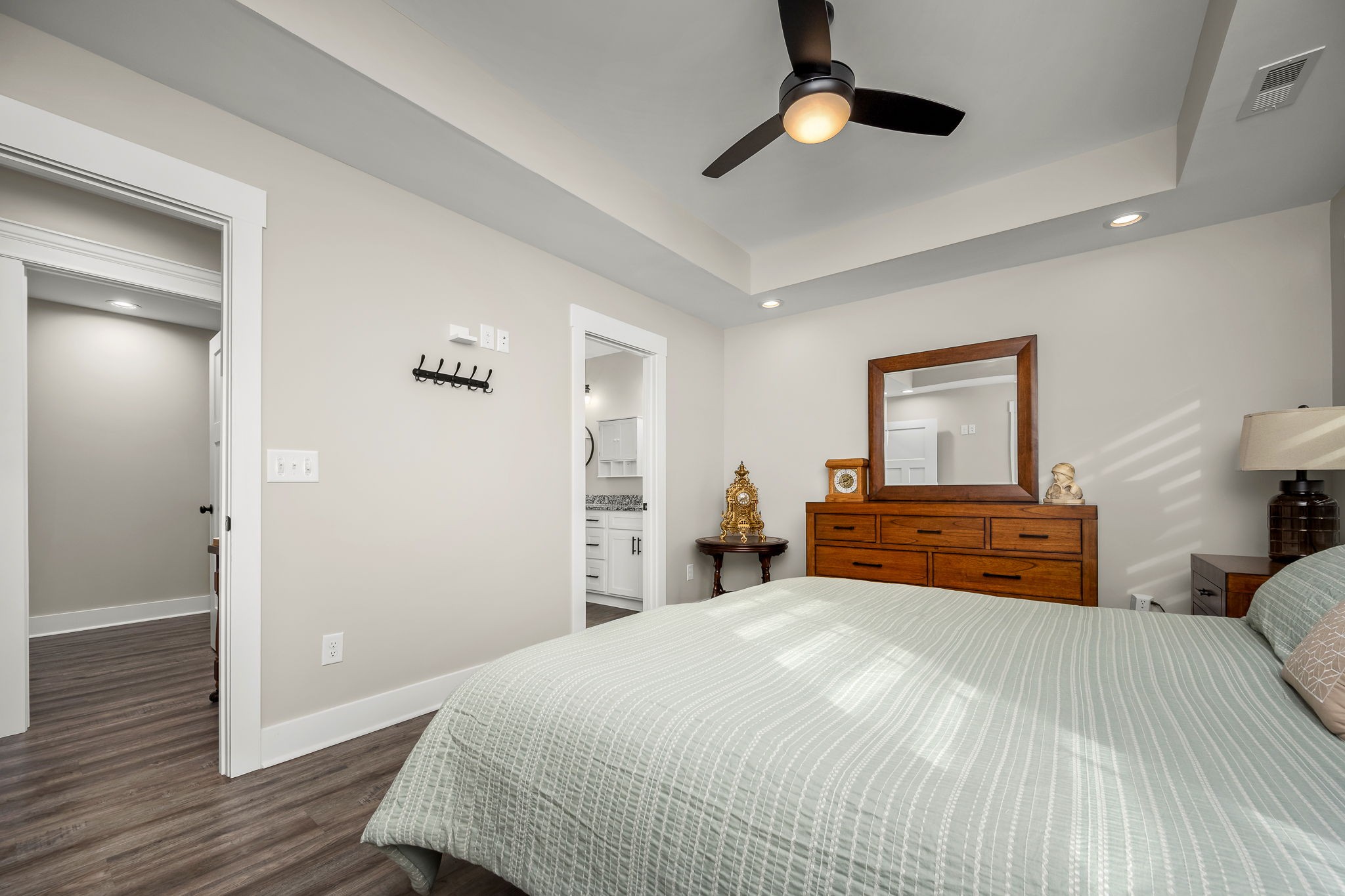 104 Rolling Road Shelbyville, TN 37160 - Photo 19 of 44 a bedroom with a bed and wooden floor