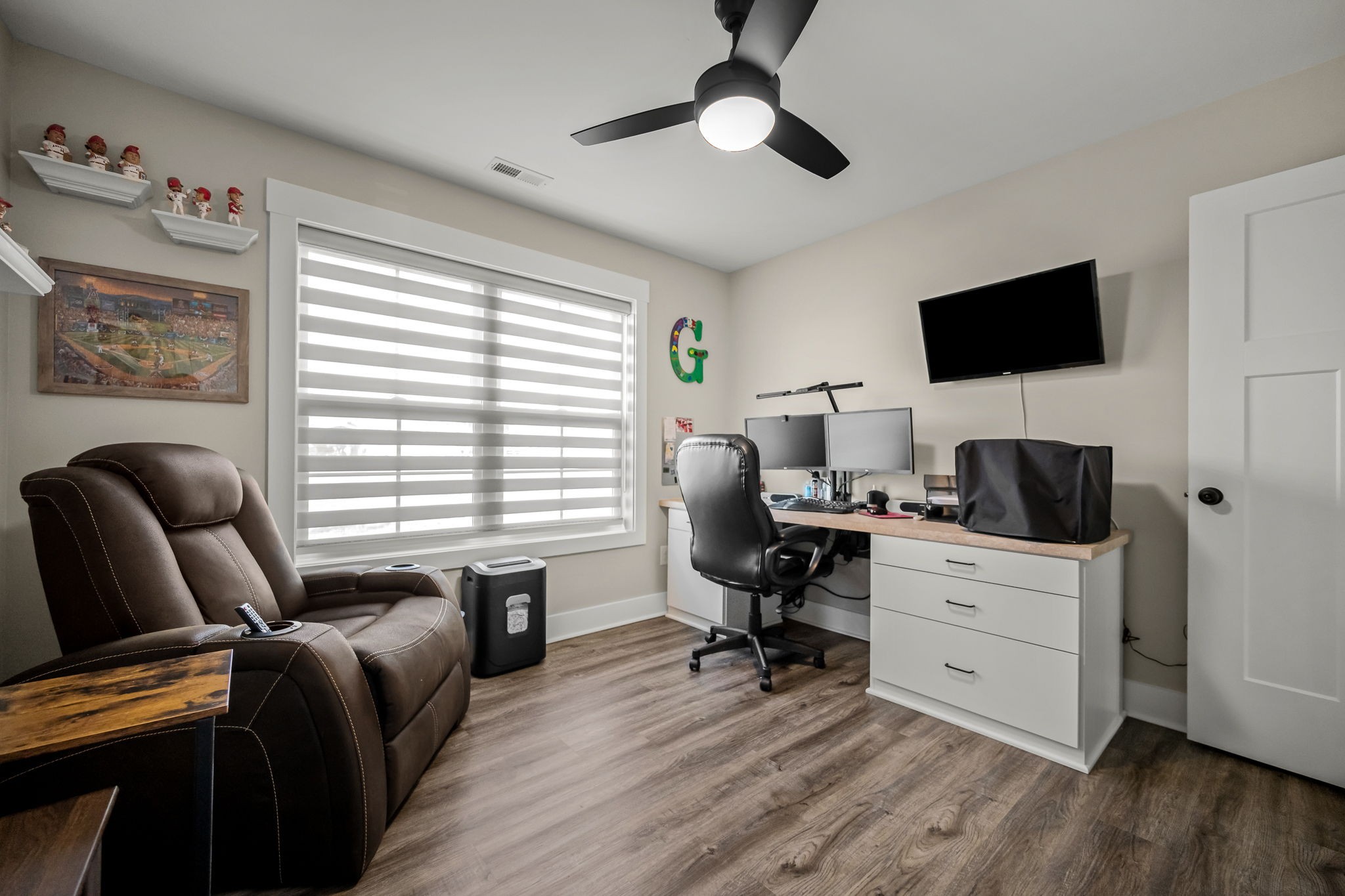 104 Rolling Road Shelbyville, TN 37160 - Photo 29 of 44 a view of a workspace with furniture and a window