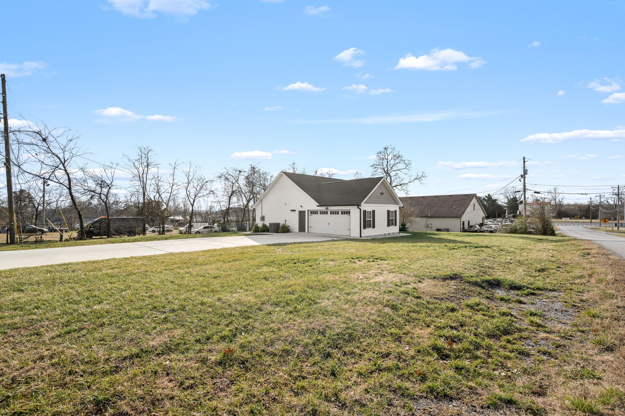104 Rolling Road Shelbyville, TN 37160 - Photo 40 of 44 a view of a house with a yard