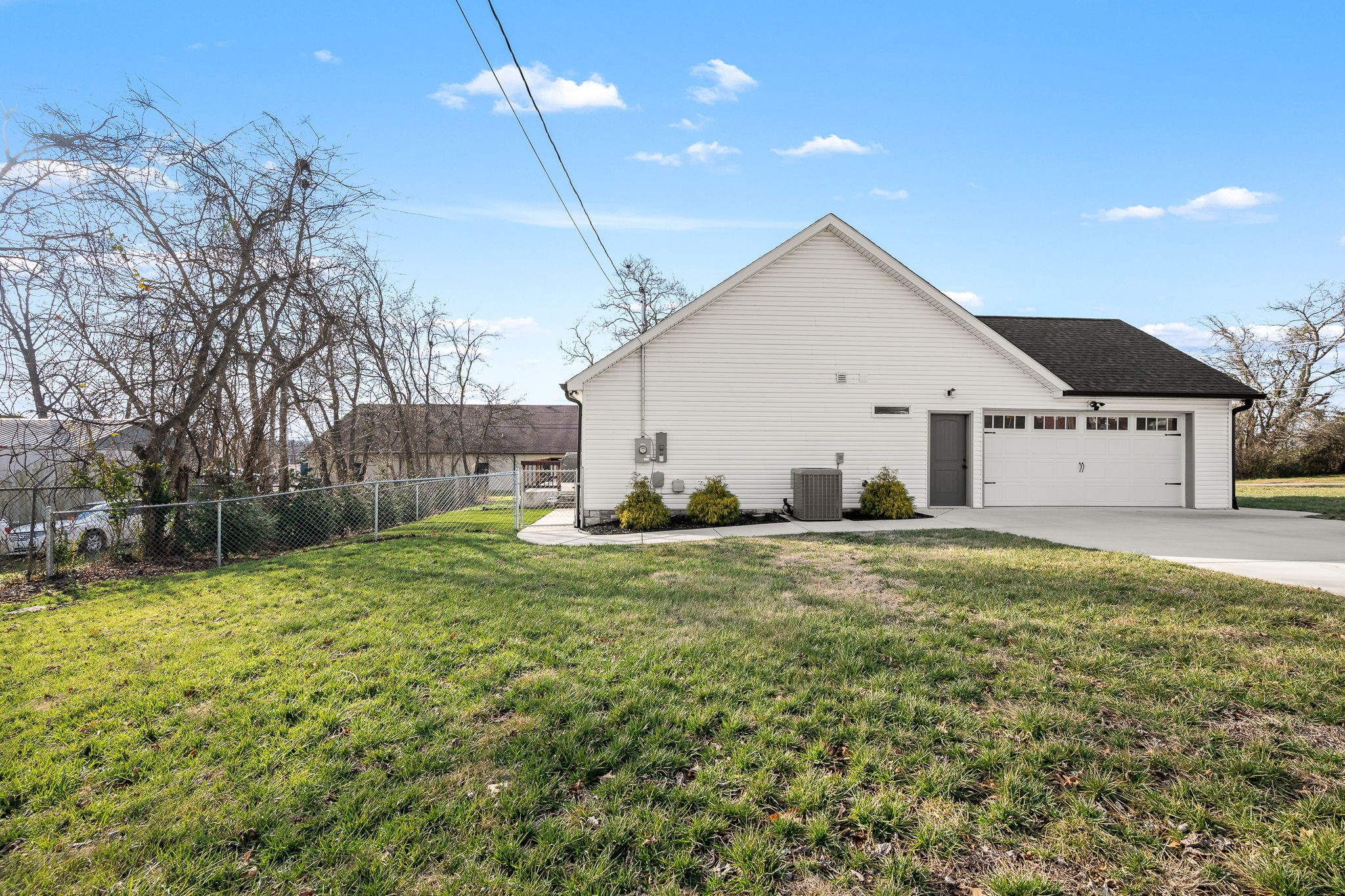 104 Rolling Road Shelbyville, TN 37160 - Photo 42 of 44 a view of a house with a yard