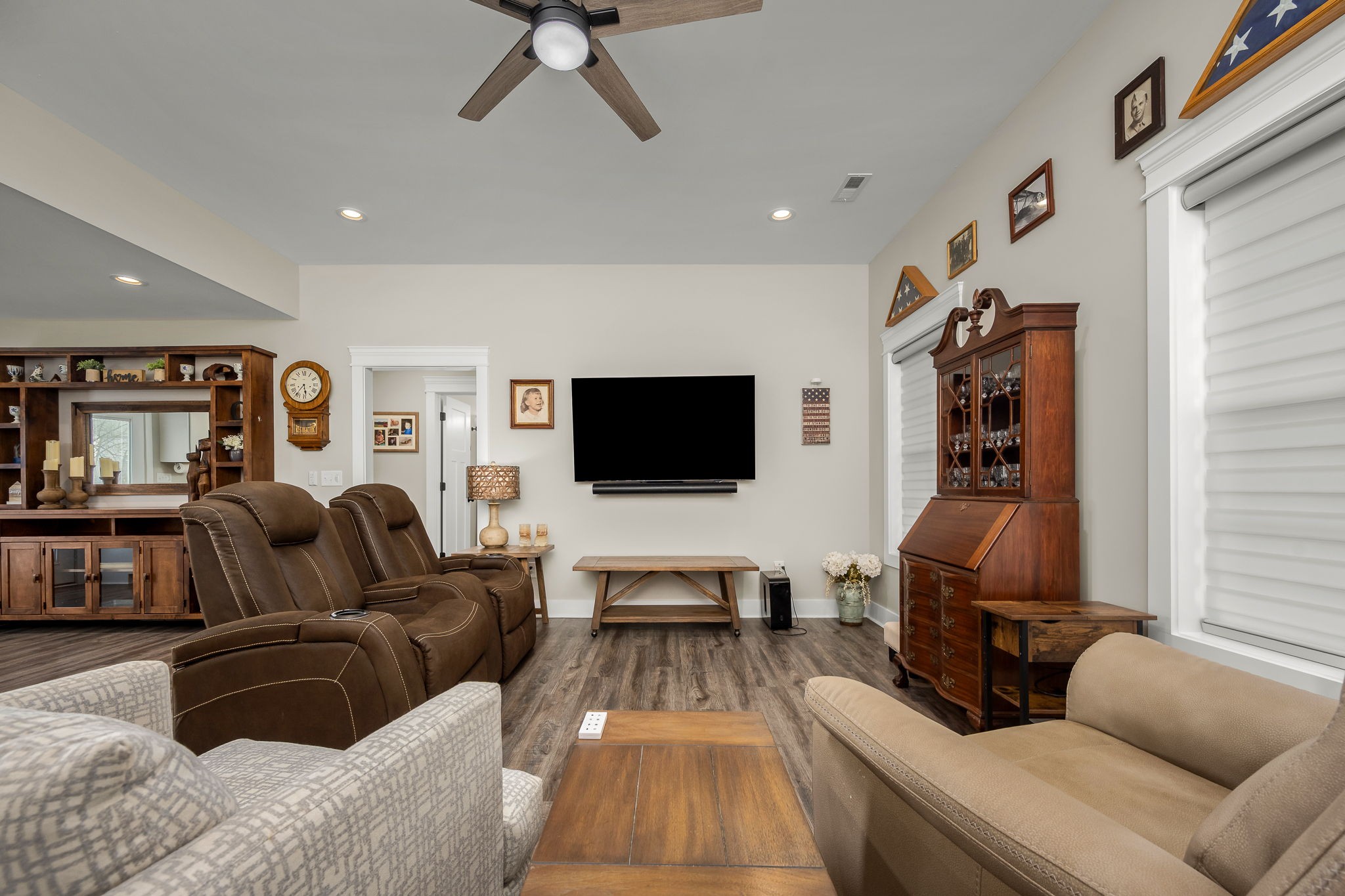 104 Rolling Road Shelbyville, TN 37160 - Photo 6 of 44 a living room with furniture and a flat screen tv