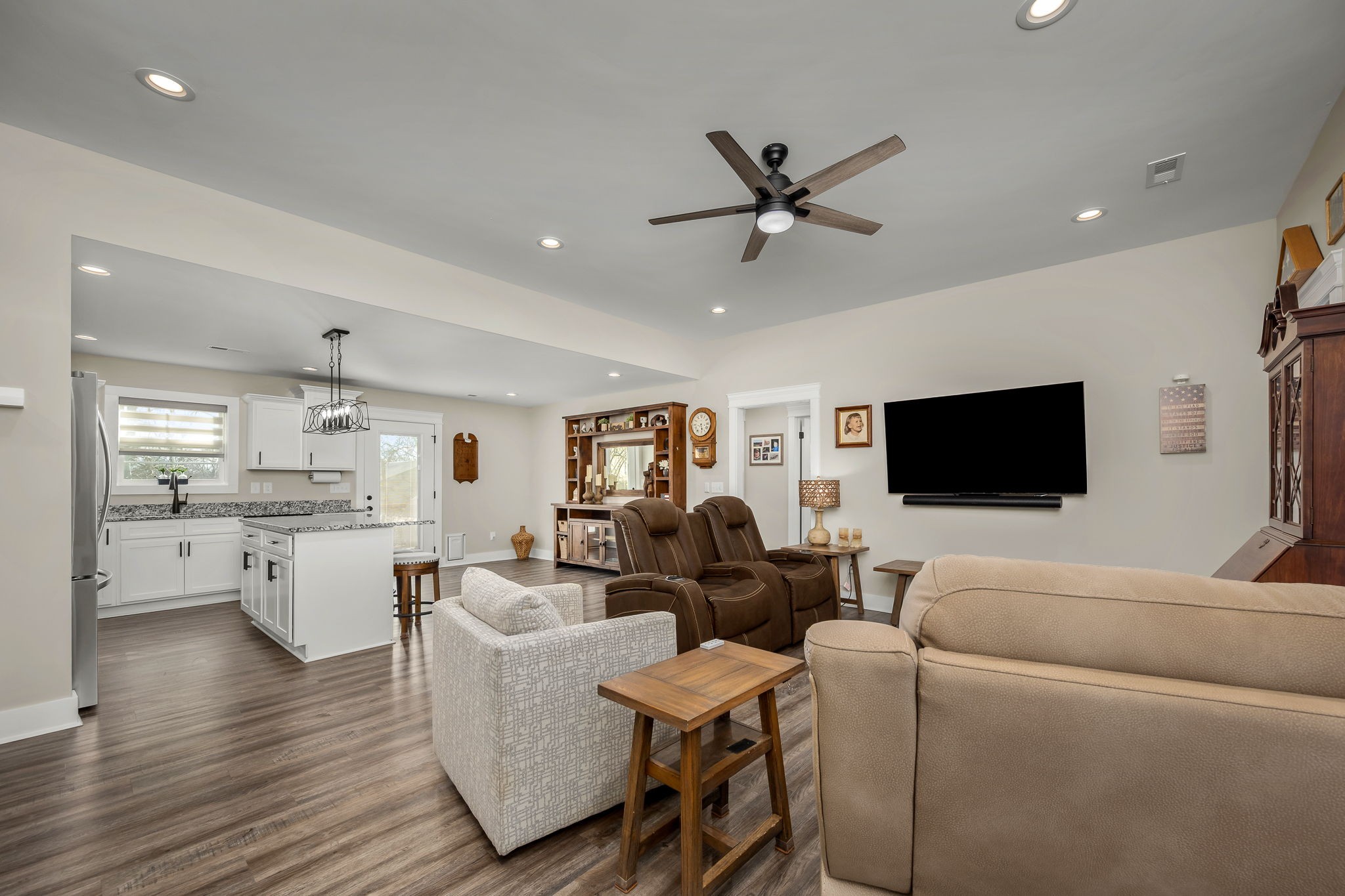 104 Rolling Road Shelbyville, TN 37160 - Photo 7 of 44 a living room with furniture and a flat screen tv