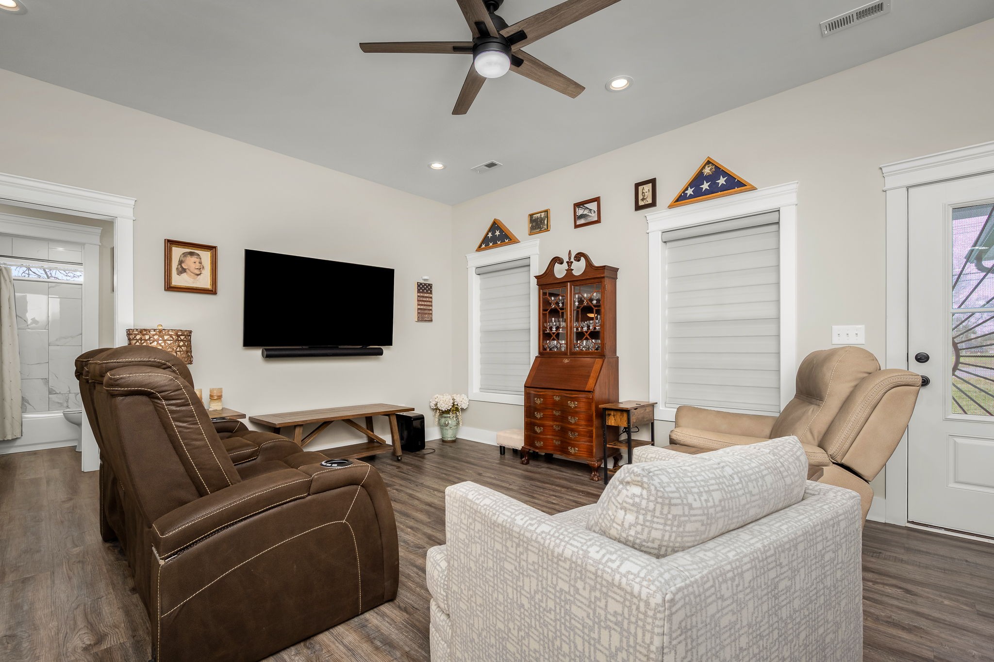 104 Rolling Road Shelbyville, TN 37160 - Photo 8 of 44 a living room with furniture and a flat screen tv