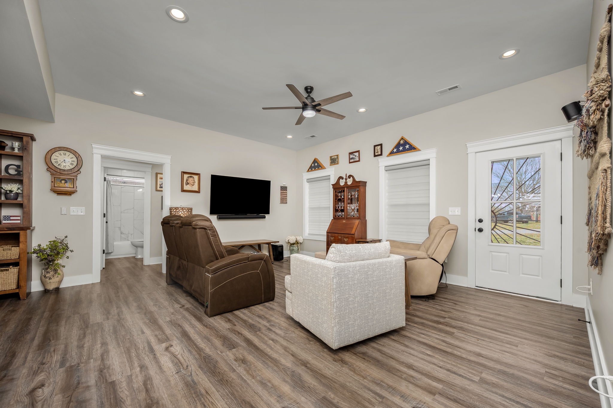 104 Rolling Road Shelbyville, TN 37160 - Photo 10 of 44 a living room with furniture and a flat screen tv