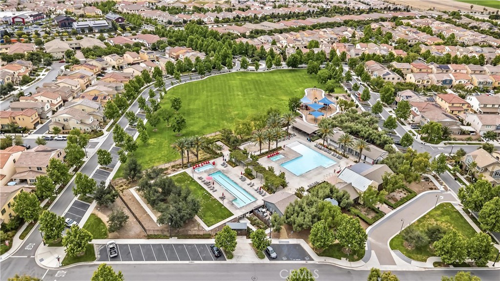 3380 Pine Ridge Loop Ontario, CA 91761 - Photo 33 of 37 an aerial view of residential houses with outdoor space and trees all around
