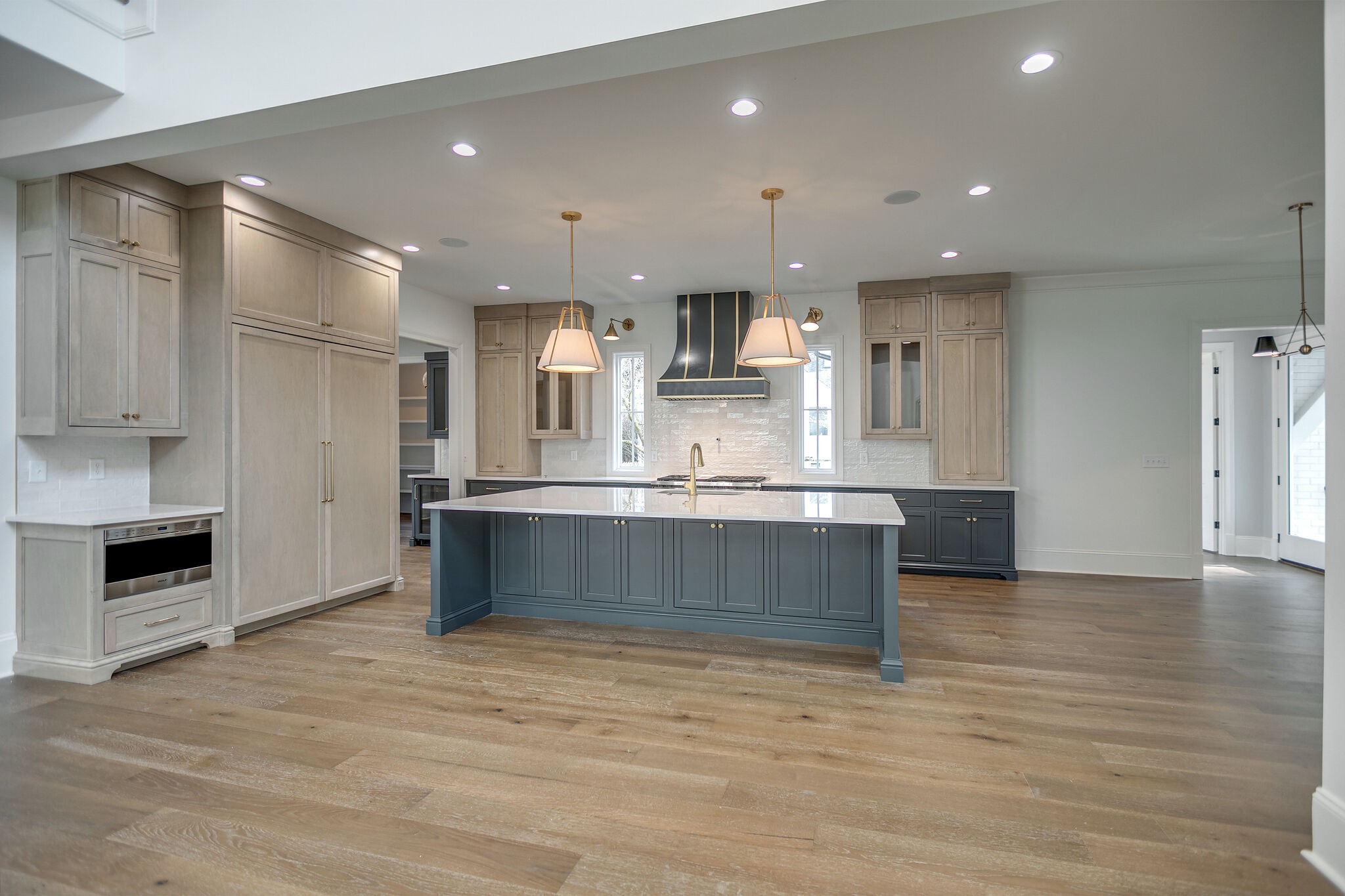 4101 Sneed Road Nashville, TN 37215 - Photo 17 of 63 a large kitchen with kitchen island a sink stainless steel appliances and cabinets