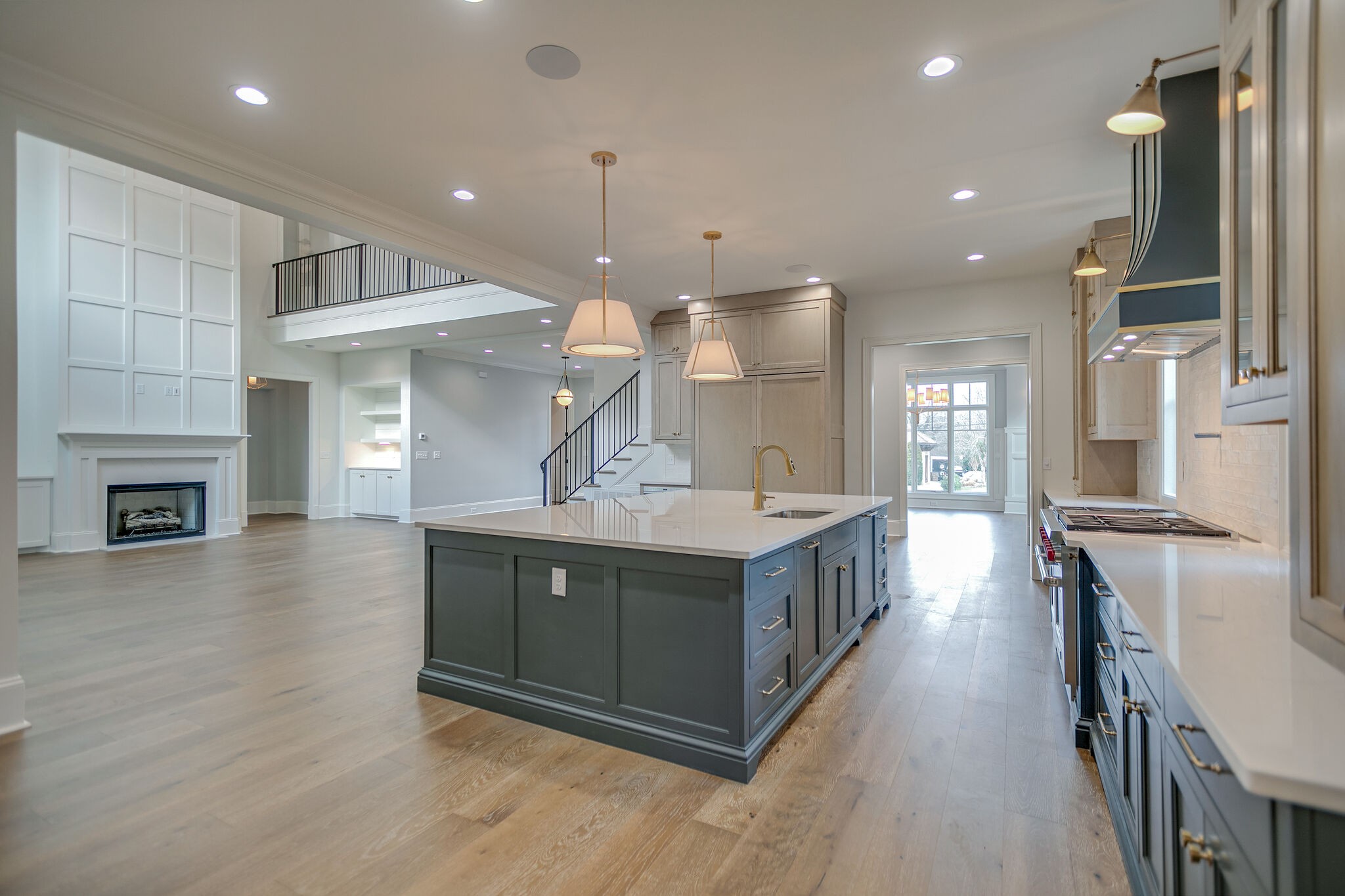 4101 Sneed Road Nashville, TN 37215 - Photo 19 of 63 a kitchen with stainless steel appliances granite countertop a lot of cabinets and wooden floors