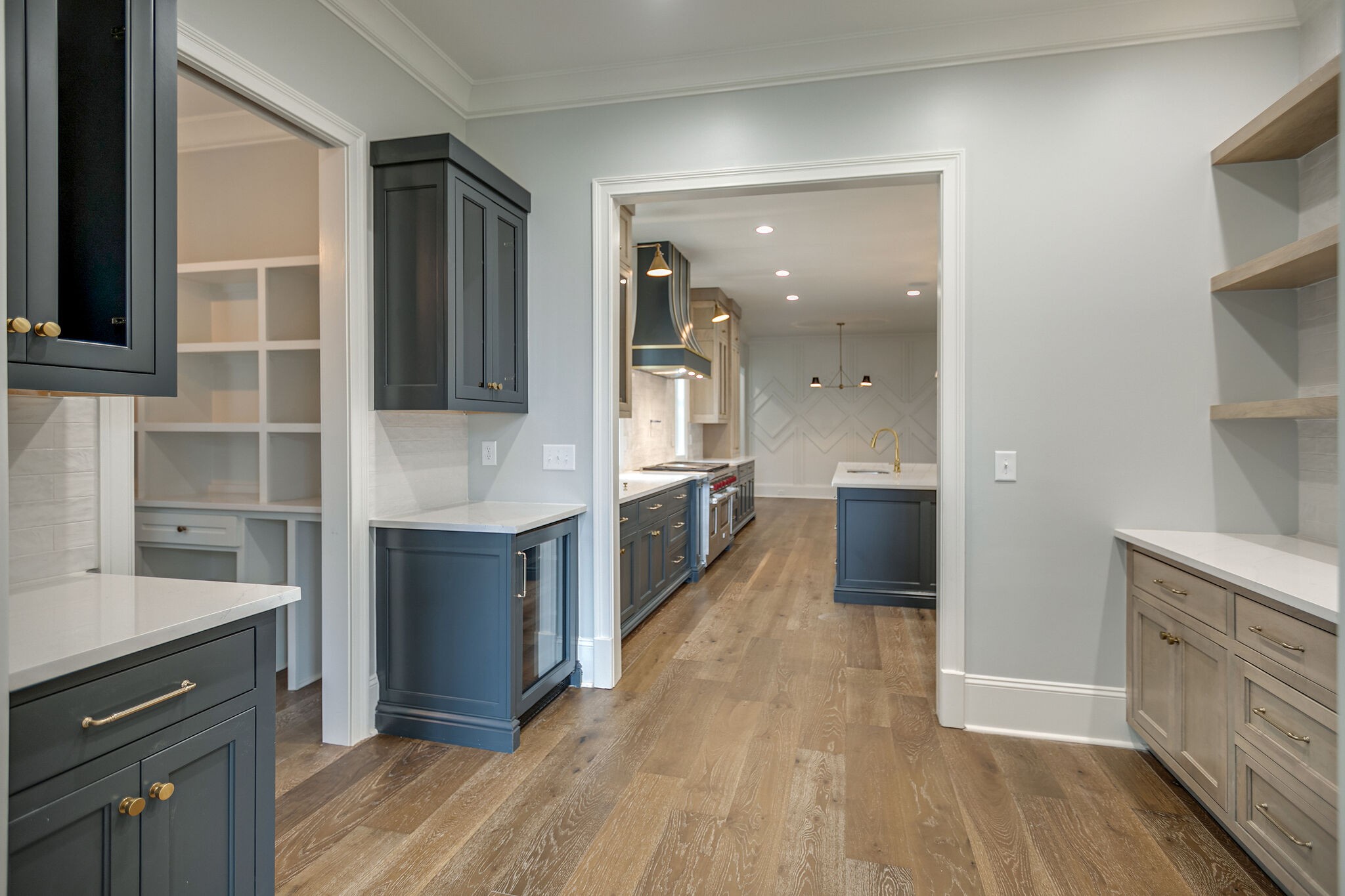 4101 Sneed Road Nashville, TN 37215 - Photo 22 of 63 a large kitchen with a center island wooden floor and stainless steel appliances