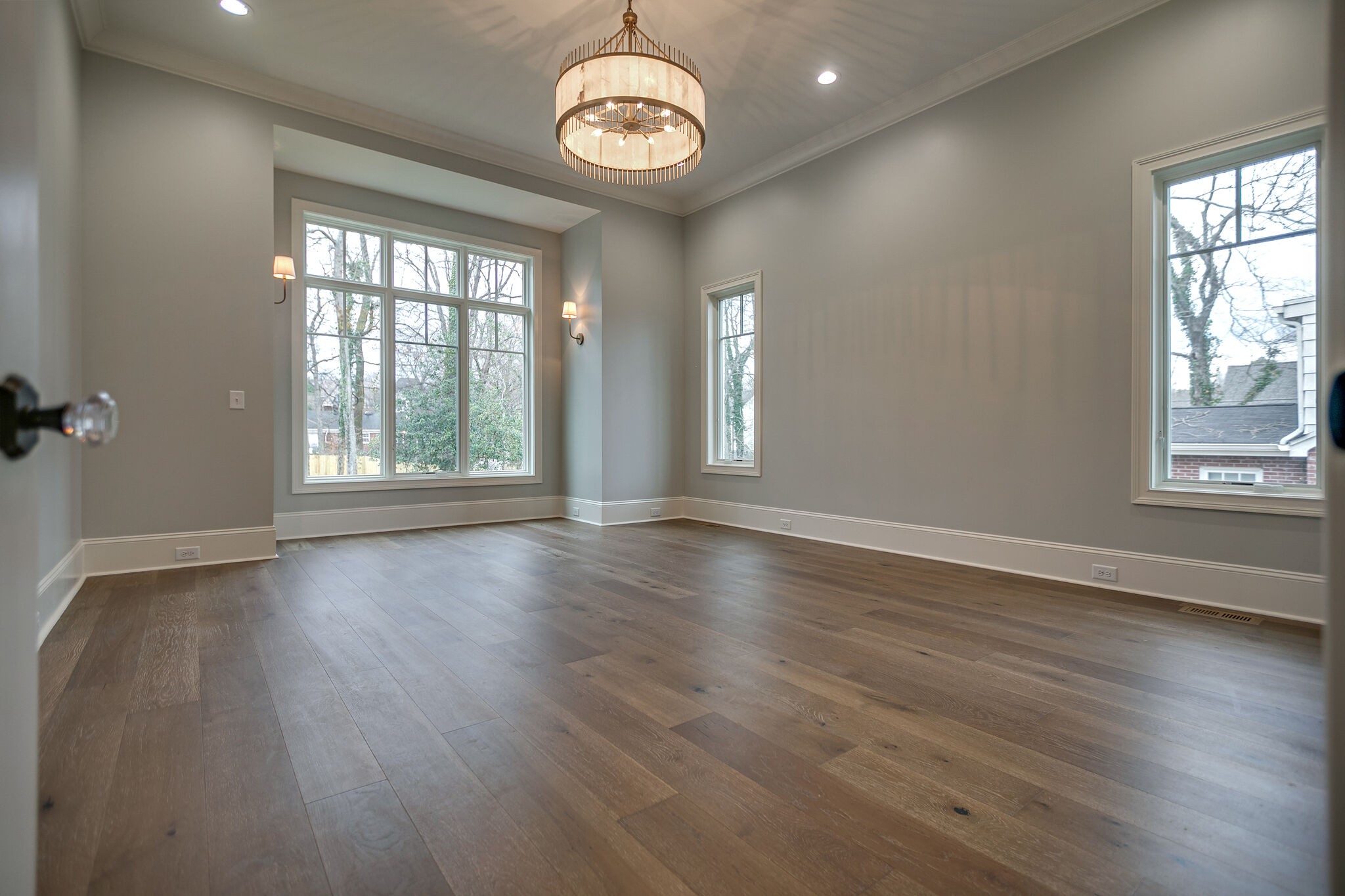 4101 Sneed Road Nashville, TN 37215 - Photo 28 of 63 an empty room with wooden floor and windows
