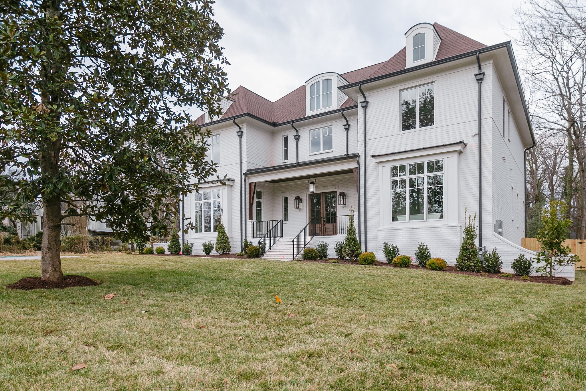 4101 Sneed Road Nashville, TN 37215 - Photo 3 of 63 a front view of a house with a yard