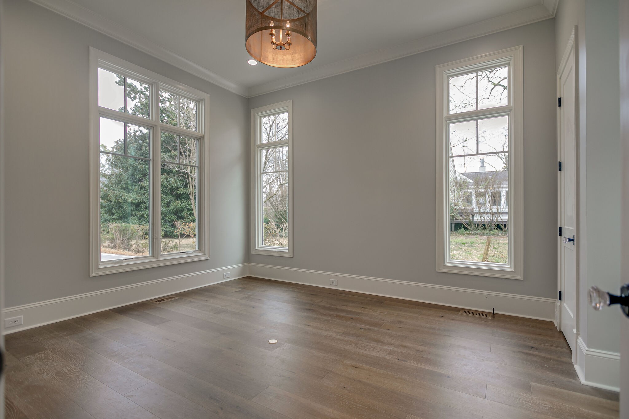 4101 Sneed Road Nashville, TN 37215 - Photo 35 of 63 a view of an empty room with wooden floor and a window