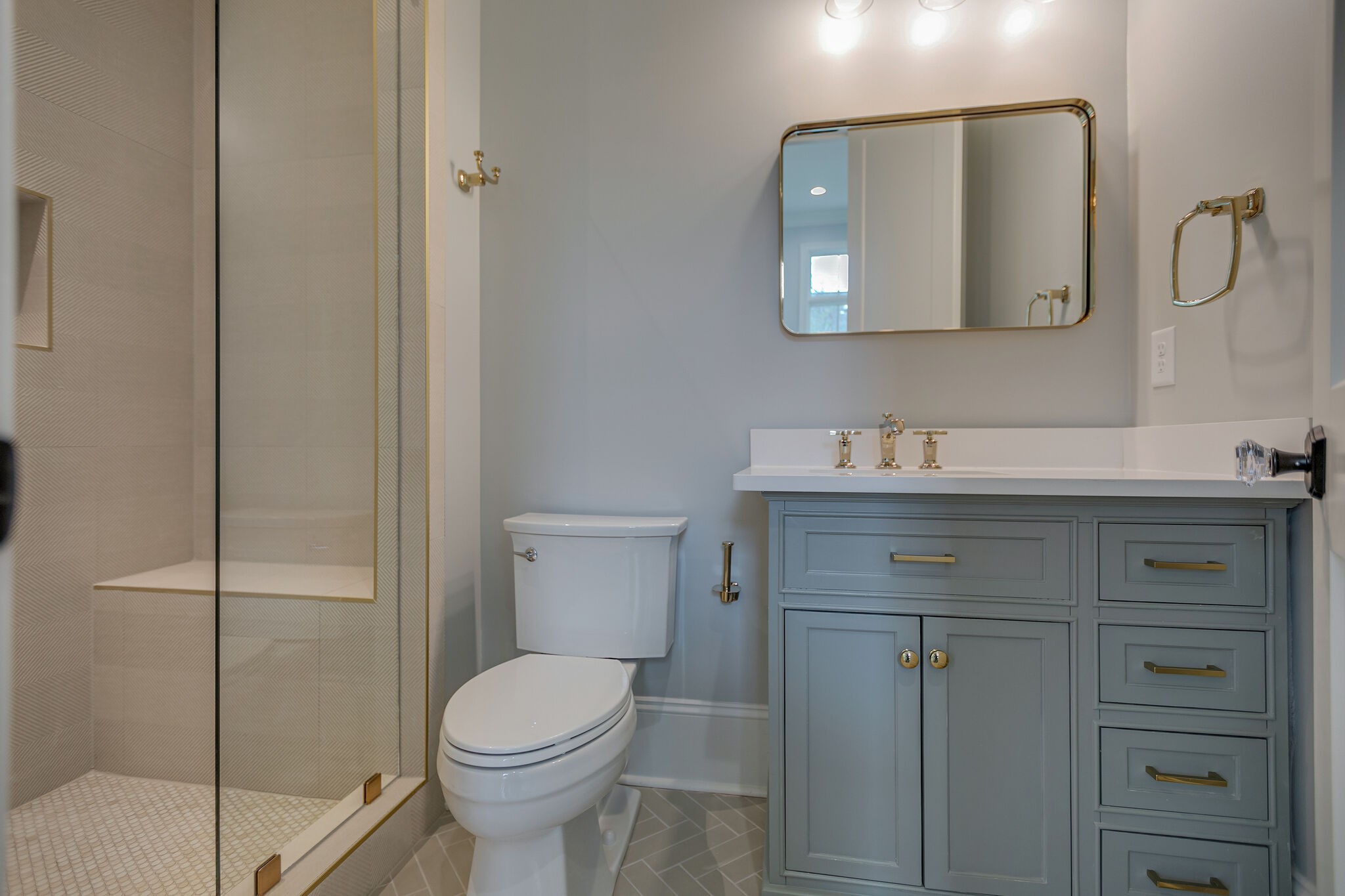 4101 Sneed Road Nashville, TN 37215 - Photo 37 of 63 a bathroom with a toilet sink and mirror