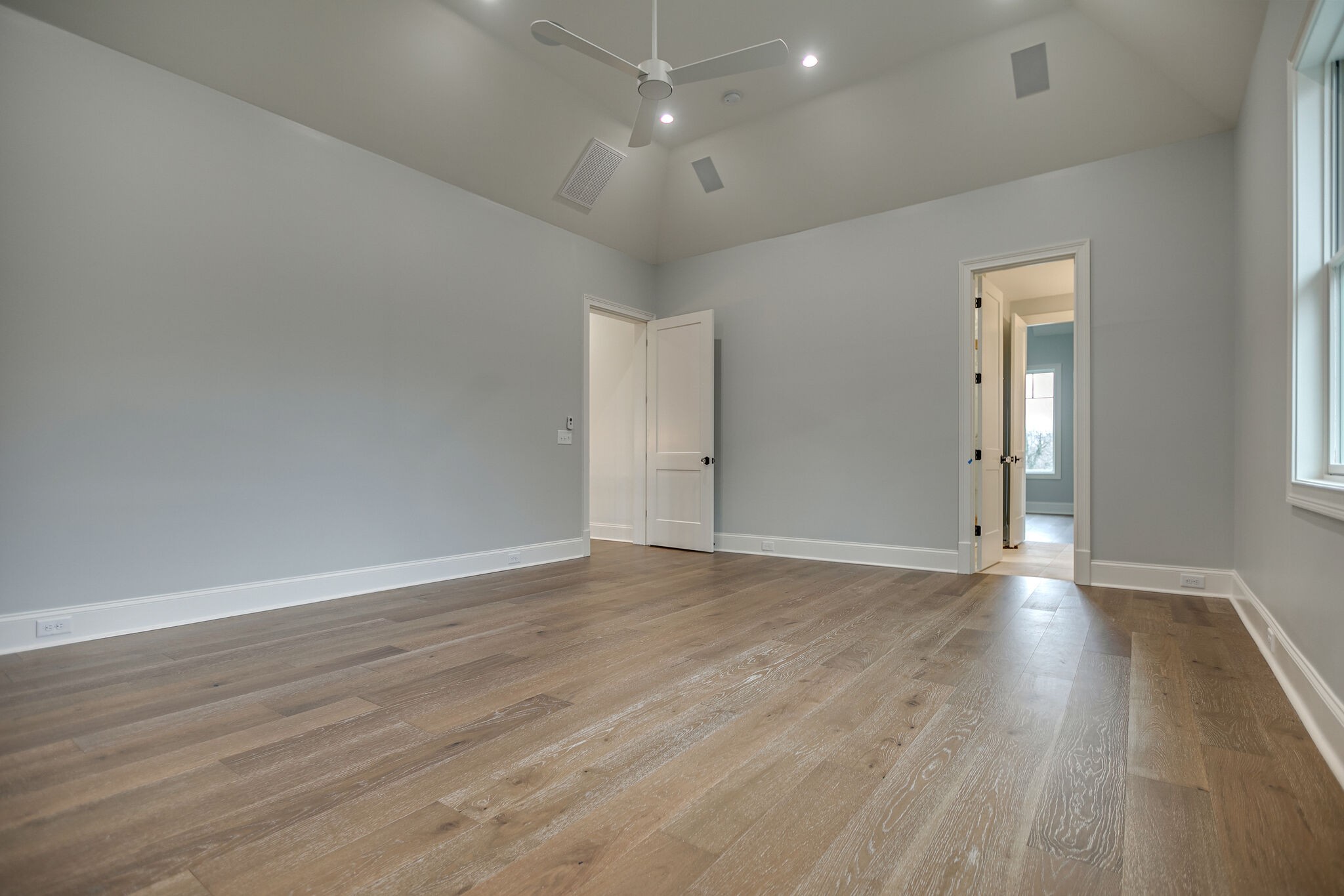 4101 Sneed Road Nashville, TN 37215 - Photo 42 of 63 an empty room with wooden floor and windows