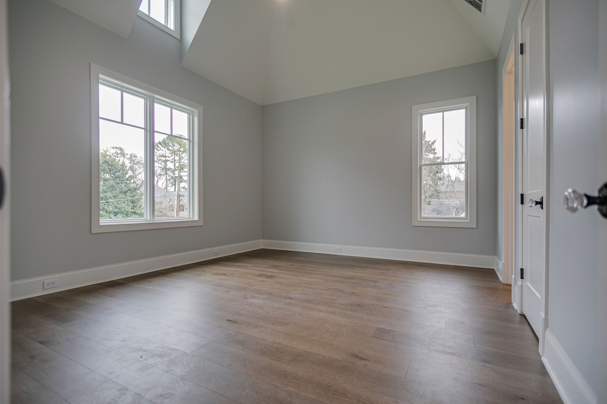 4101 Sneed Road Nashville, TN 37215 - Photo 44 of 63 a view of an empty room with wooden floor and a window
