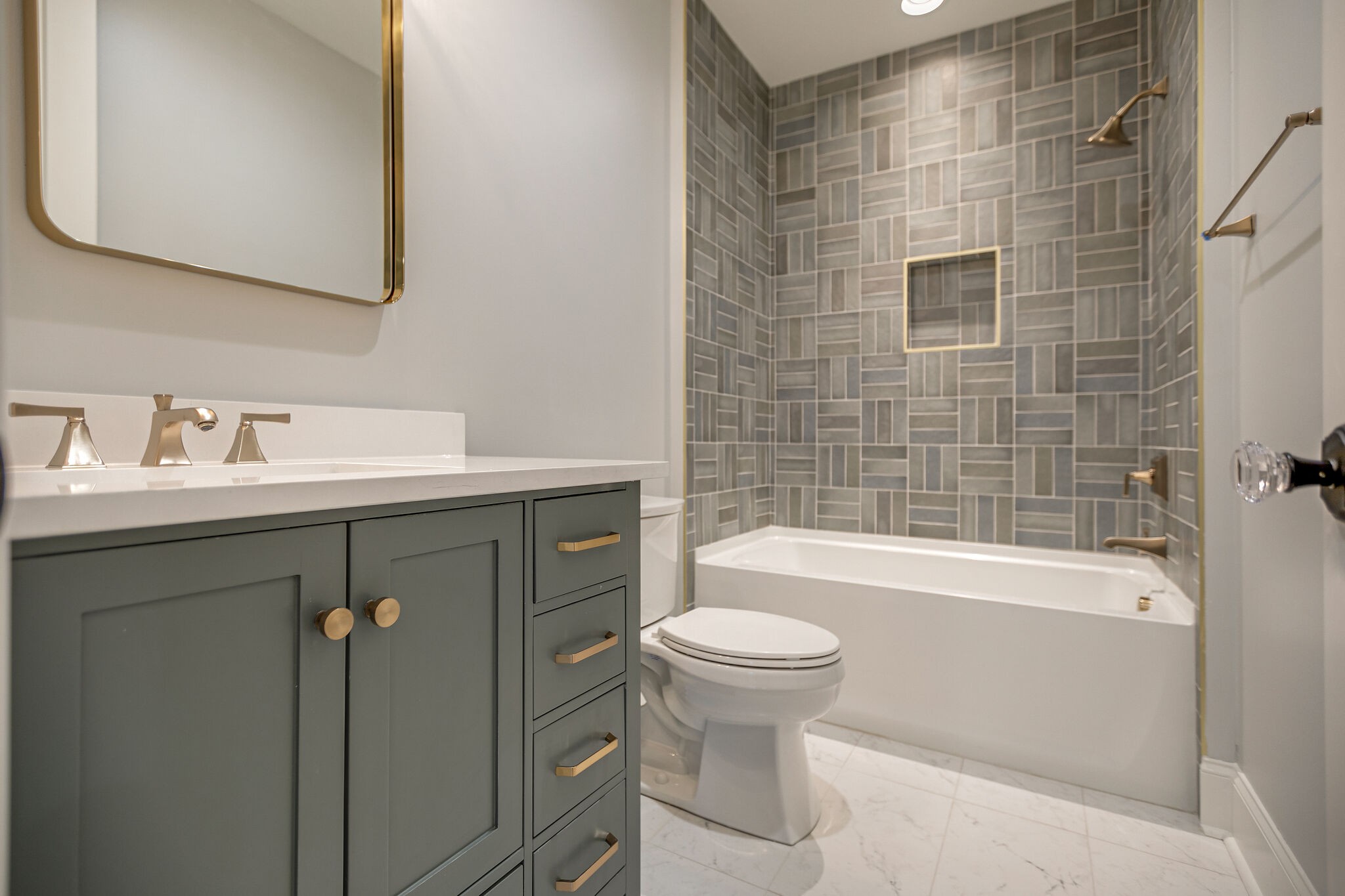 4101 Sneed Road Nashville, TN 37215 - Photo 52 of 63 a bathroom with a sink a toilet and bathtub
