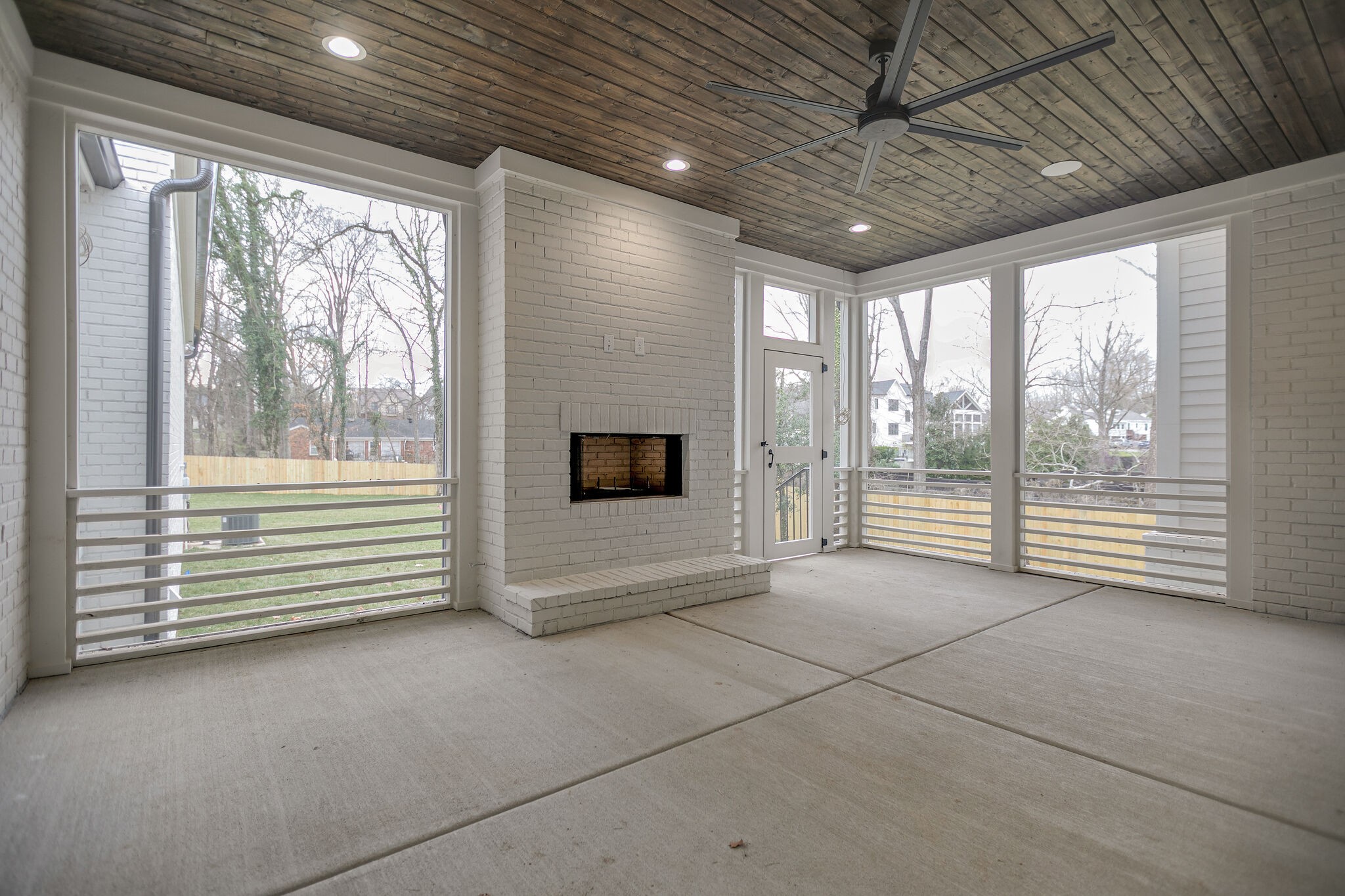 4101 Sneed Road Nashville, TN 37215 - Photo 55 of 63 a view of an empty room with a fireplace and a window
