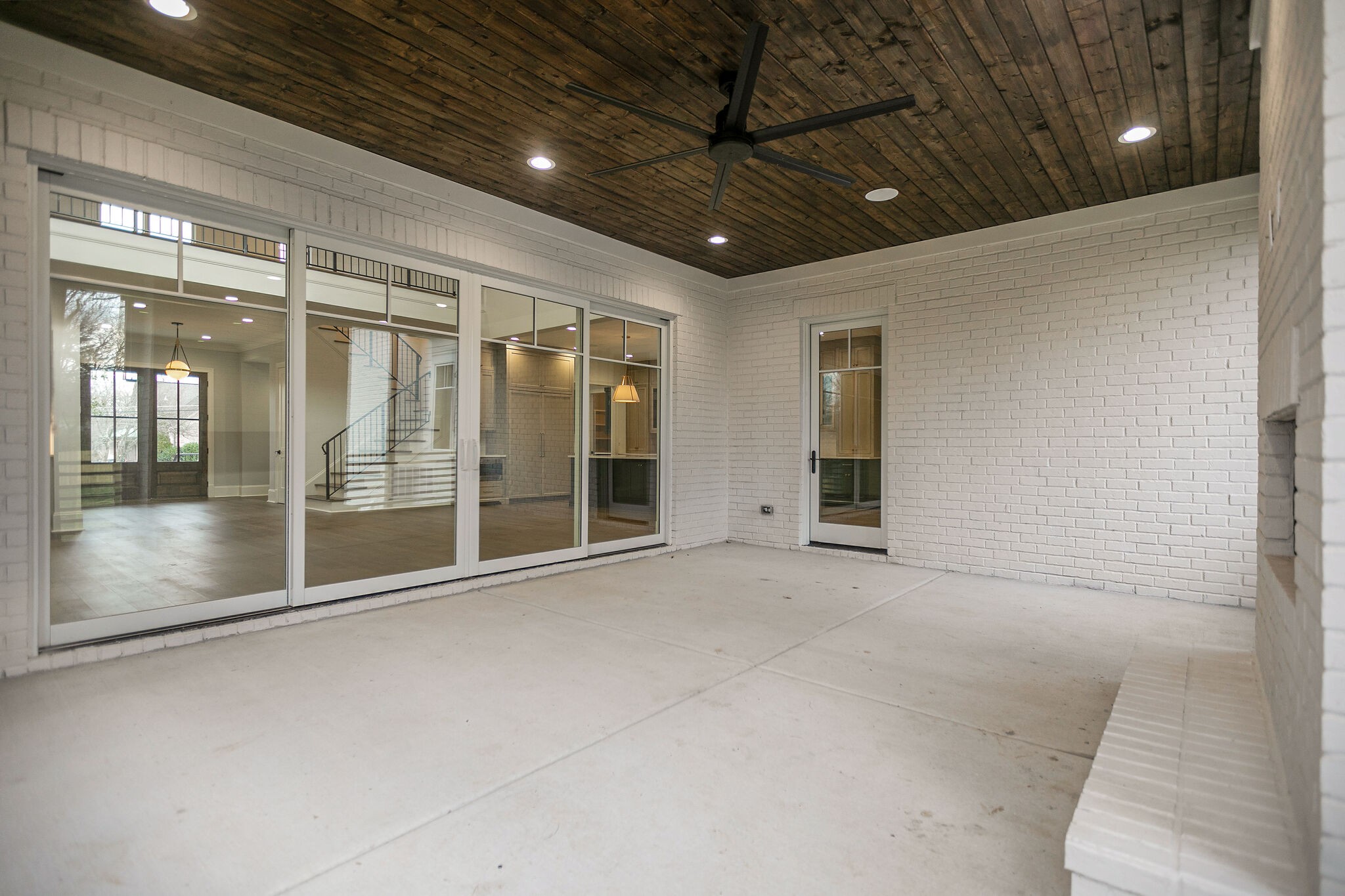4101 Sneed Road Nashville, TN 37215 - Photo 56 of 63 a view of an empty room with a sliding door and windows