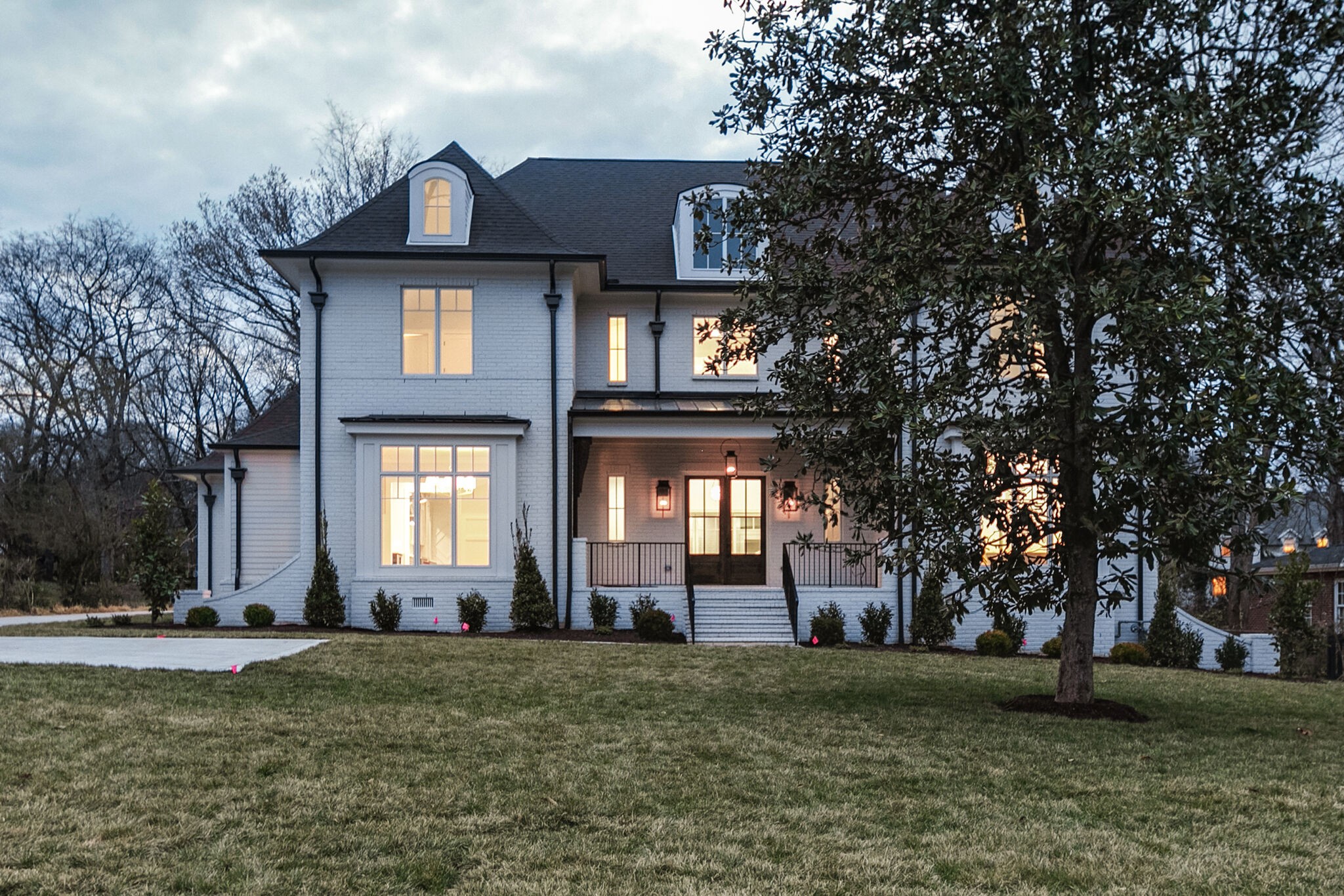 4101 Sneed Road Nashville, TN 37215 - Photo 62 of 63 a front view of a house with a garden