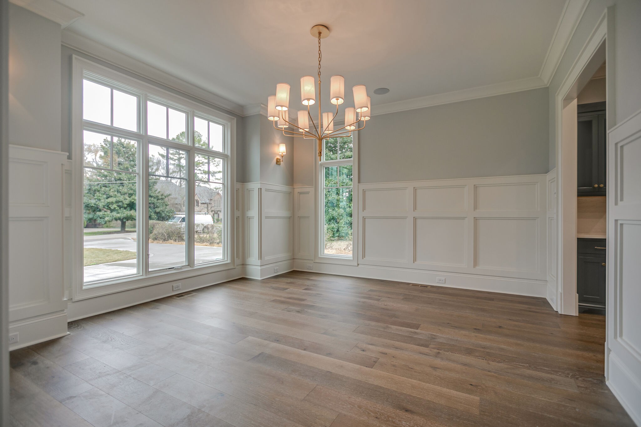 4101 Sneed Road Nashville, TN 37215 - Photo 10 of 63 a view of an empty room with wooden floor and a window