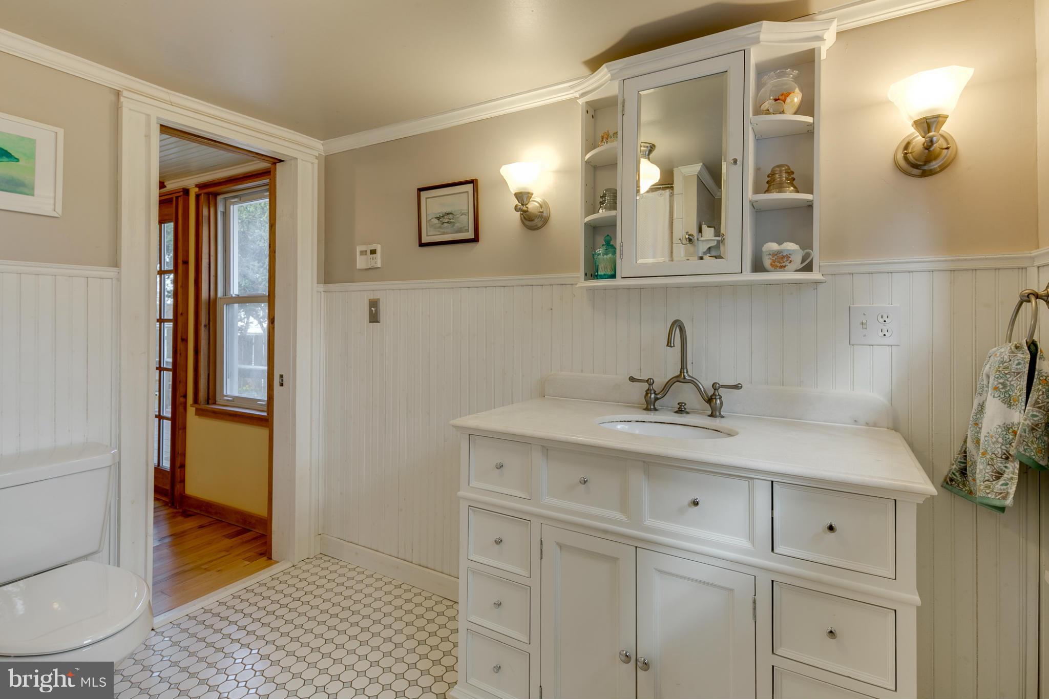 5324 Sweet Air Road Baldwin, MD 21013 - Photo 16 of 30 a bathroom with a sink and a mirror