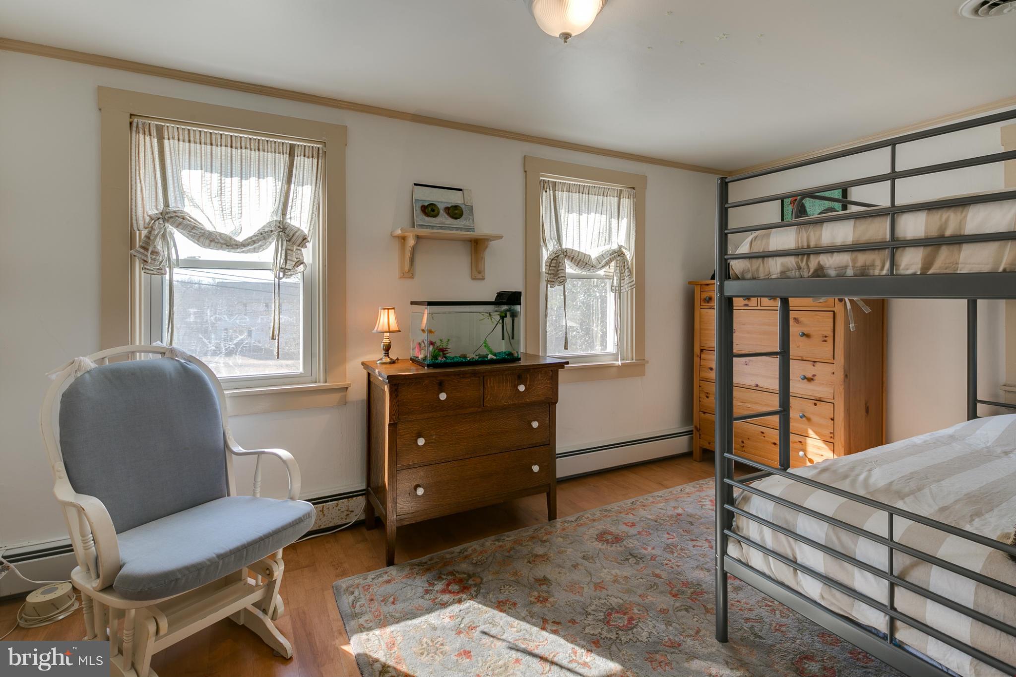 5324 Sweet Air Road Baldwin, MD 21013 - Photo 23 of 30 a bedroom with a bed and large window