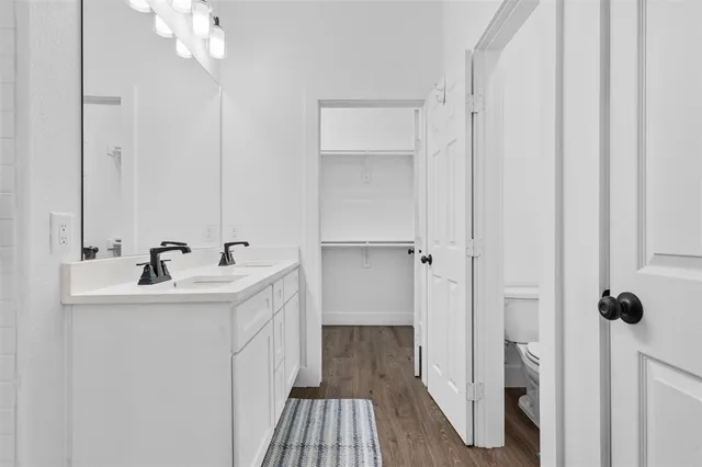 a bathroom with a sink and mirror
