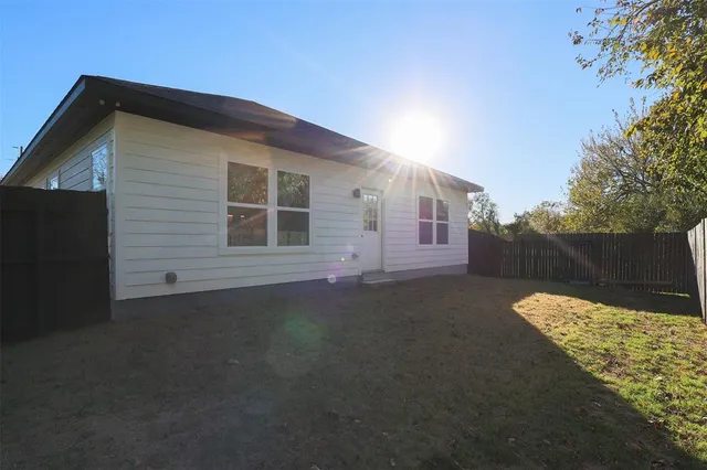 a backyard of a house with lots of green space