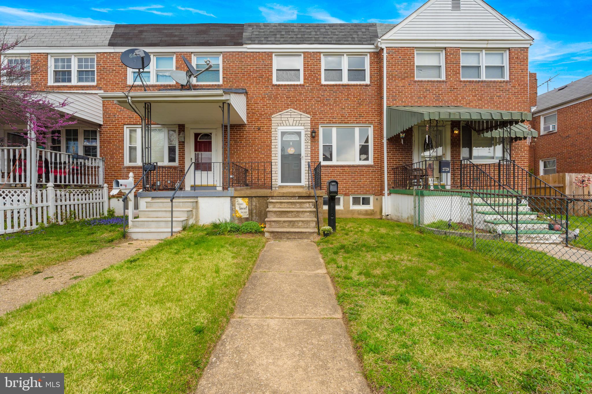 2727 Creston Road Baltimore, MD 21222 - Photo 1 of 30 a front view of a house with a yard