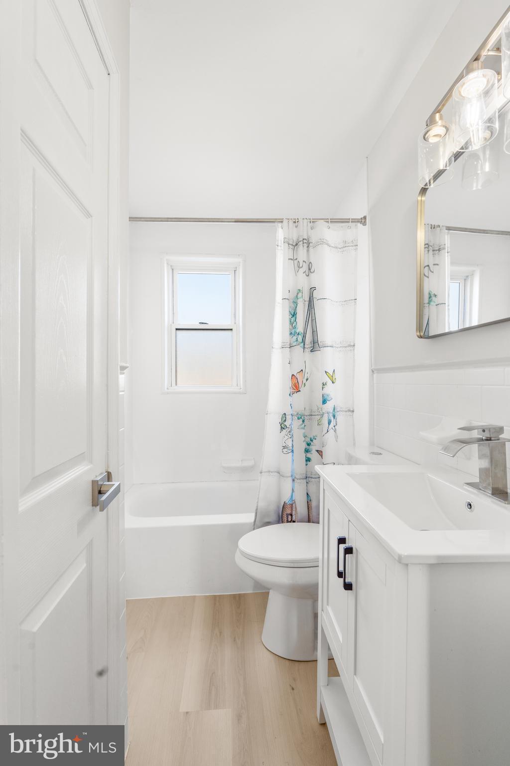 2727 Creston Road Baltimore, MD 21222 - Photo 20 of 30 a bathroom with a sink toilet and shower