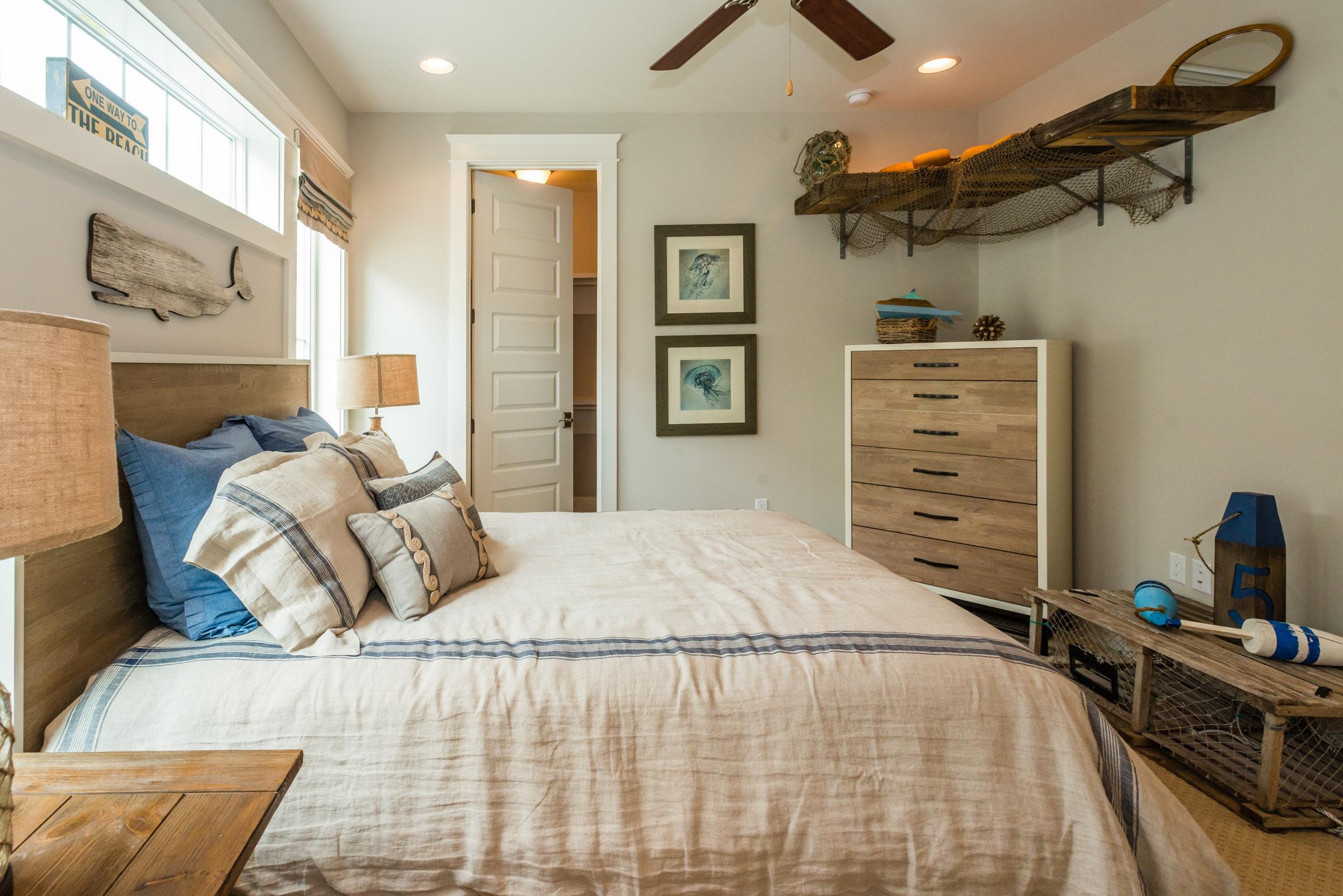 35 Prominence Inlet Beach, Unit 35 Inlet Beach, FL 32461 - Photo 33 of 43 a bedroom with a bed and a flat screen tv
