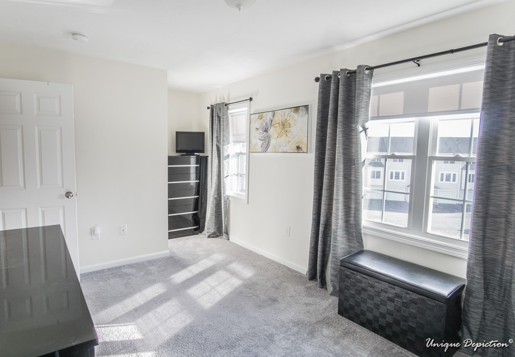 41 Boston Road, Unit 451 Billerica, MA 01862 - Photo 15 of 20 a view of bedroom with furniture and window