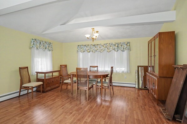 59 Donald Road Burlington, MA 01803 - Photo 5 of 12 a view of a dining room with furniture window and wooden floor