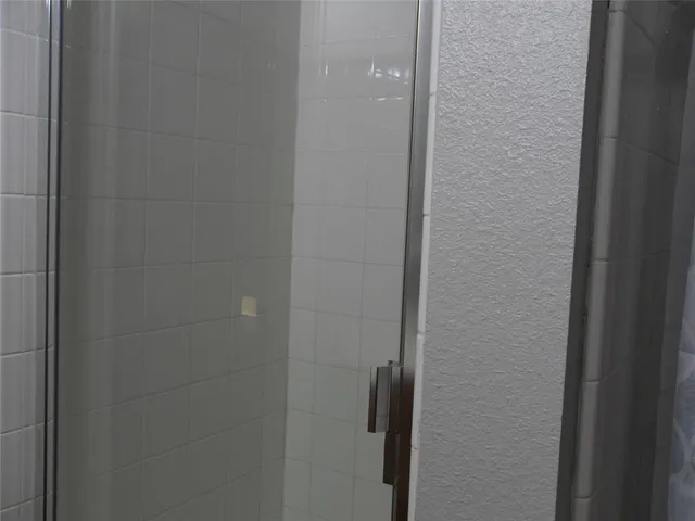 a bathroom with a toilet and a sink