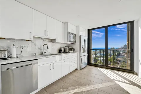 a view of a city with tall buildings