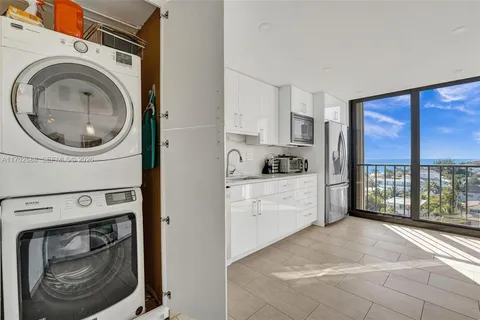 a view of a swimming pool with a lounge chairs