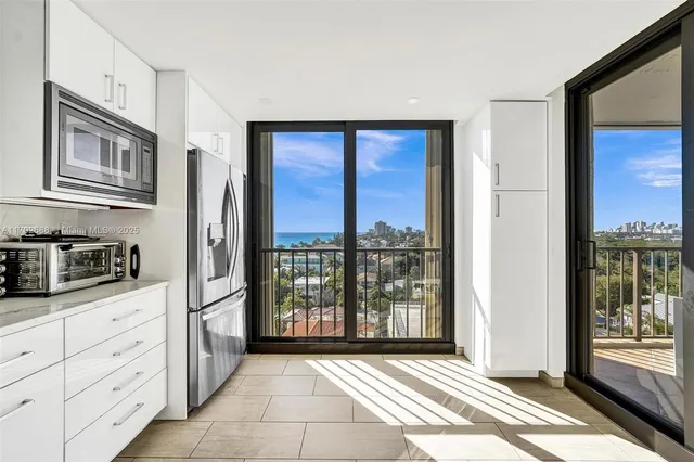 a spacious bathroom with a shower sink mirror and toilet