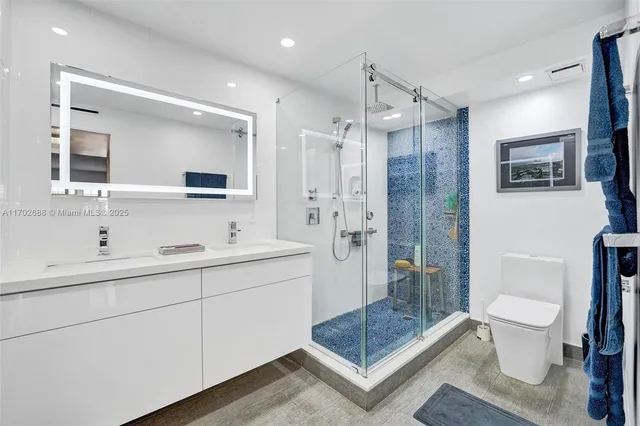 an aerial view of a city with lots of residential buildings