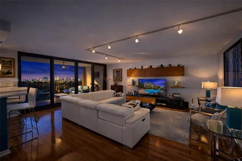 a view of a balcony with furniture