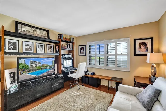 a view of a swimming pool with a lounge chairs