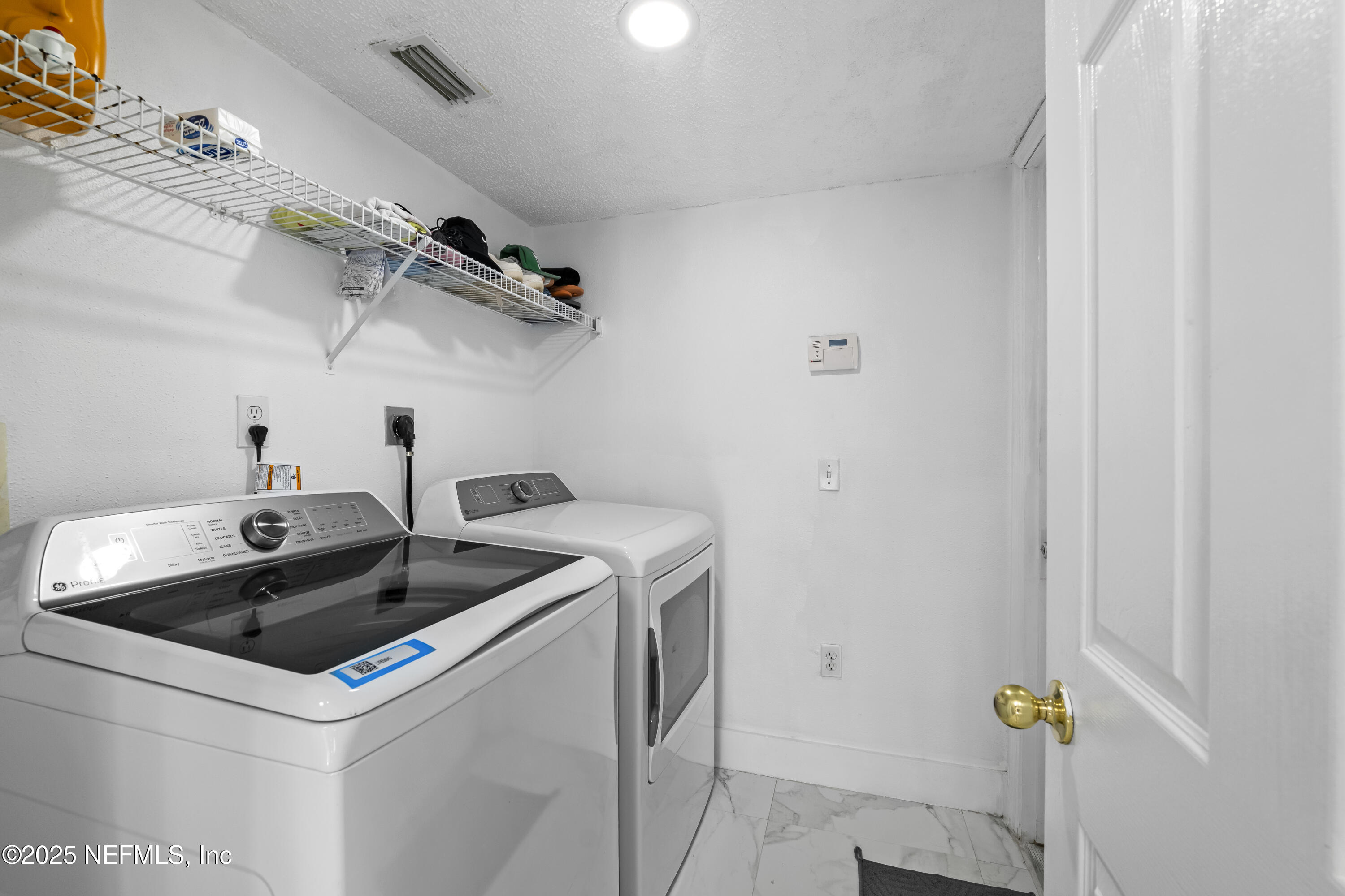 3447 Caroline Ridge Lane East Jacksonville, FL 32225 - Photo 11 of 44 a utility room with dryer and sink