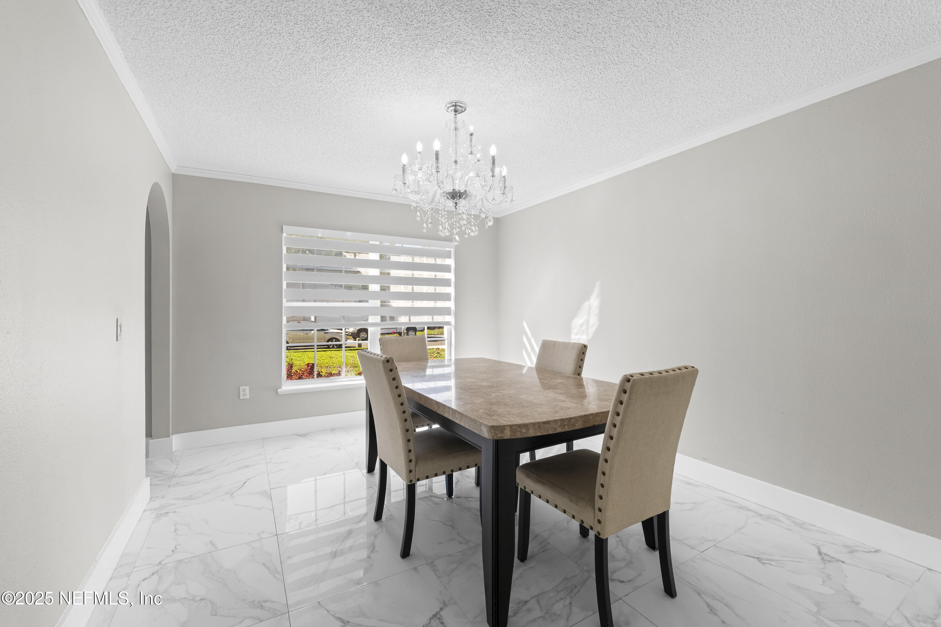 3447 Caroline Ridge Lane East Jacksonville, FL 32225 - Photo 13 of 44 a view of a dining room with furniture and window