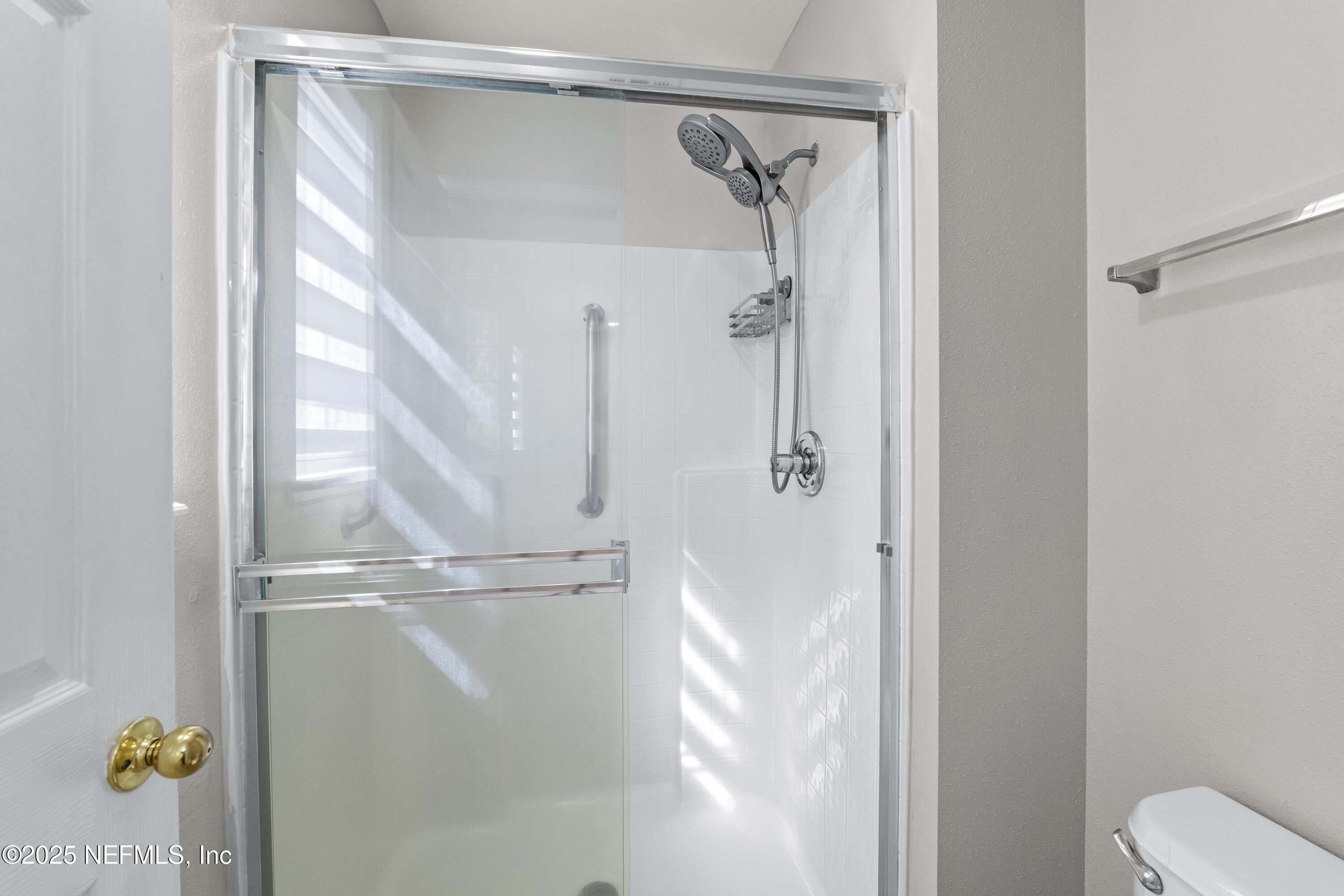 3447 Caroline Ridge Lane East Jacksonville, FL 32225 - Photo 32 of 44 a bathroom with a shower