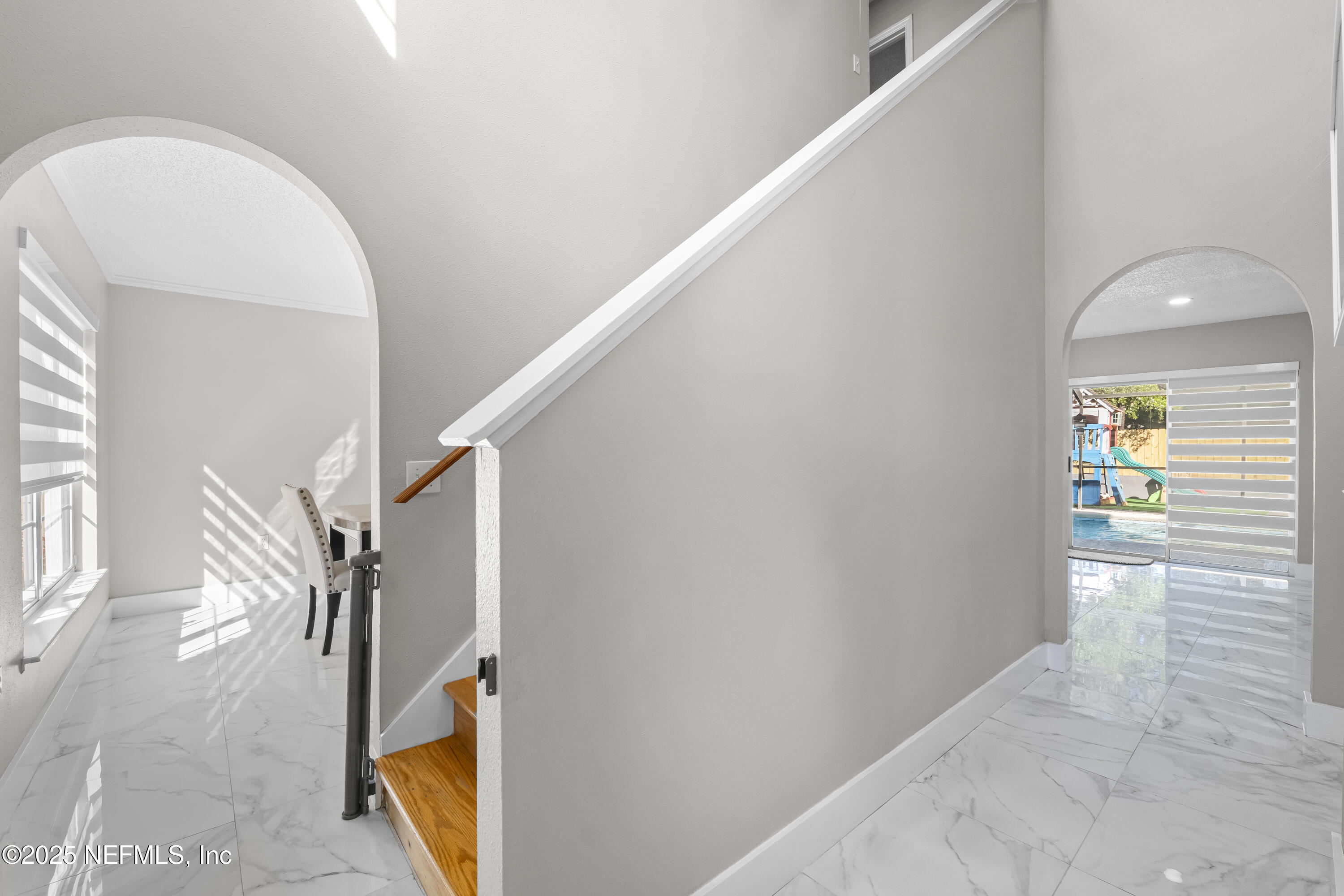 3447 Caroline Ridge Lane East Jacksonville, FL 32225 - Photo 10 of 44 a view of entryway and kitchen