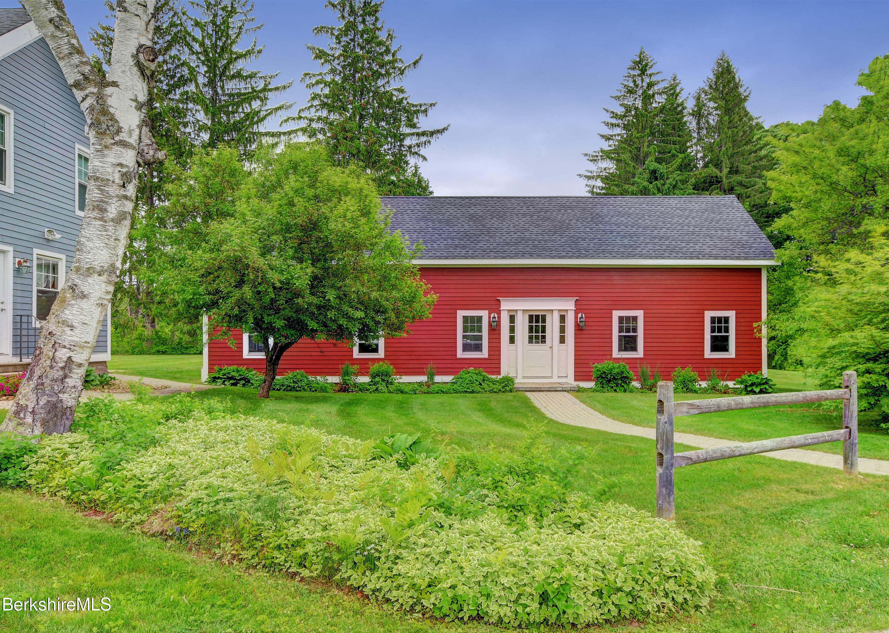 1 Devon Road Stockbridge, MA 01262 - Photo 52 of 58 a view of a house with a yard and sitting area
