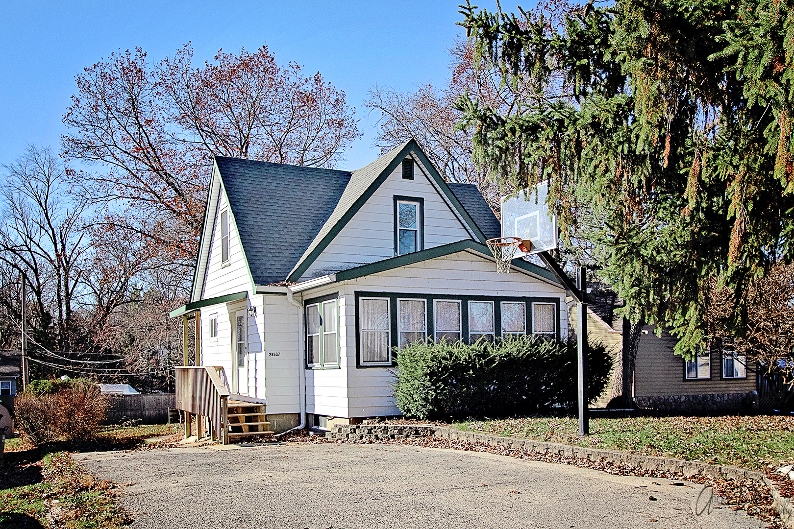 28537 West Treetop Road Ingleside, IL 60041 - Photo 1 of 29 a front view of a house with a yard and tree