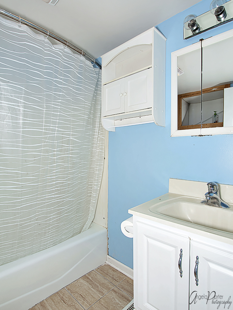 28537 West Treetop Road Ingleside, IL 60041 - Photo 20 of 29 a bathroom with a sink and a mirror