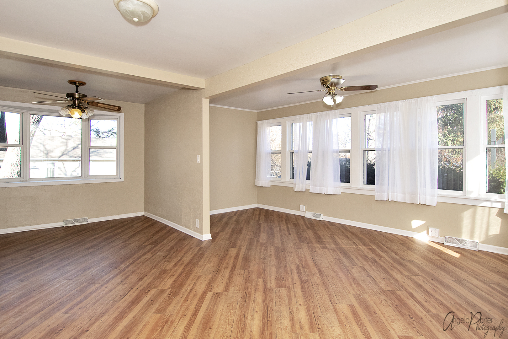 28537 West Treetop Road Ingleside, IL 60041 - Photo 8 of 29 a view of an empty room with wooden floor and a window